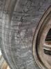 DESCRIPTION: (5) USED TIRES ON BUD WHEELS INFORMATION: 6 TO 9/32 TREAD DEPTH QTY: 5 - 7