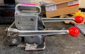 DESCRIPTION: COMBINATION STEEL STRAPPING TOOL BRAND/MODEL: SIGNODE AM-34 RETAIL$: NEW FOR $3,345.00 SIZE: 3/4" QTY: 1