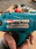 DESCRIPTION: (2) CORDLESS DRILLS AND CHARGER BRAND/MODEL: MAKITA QTY: 2 - 2