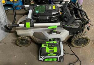 DESCRIPTION: 56V LAWN MOWER WITH BATTERY AND CHARGER BRAND/MODEL: EGO INFORMATION: LOOKS TO NEED REPAIRS QTY: 1