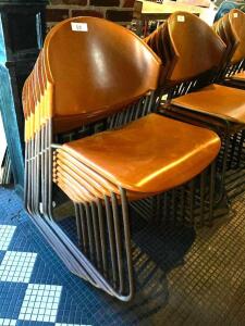 DESCRIPTION: (8) BROWN PLASTIC STACK CHAIRS. LOCATION: BAR THIS LOT IS: SOLD BY THE PIECE QTY: 8