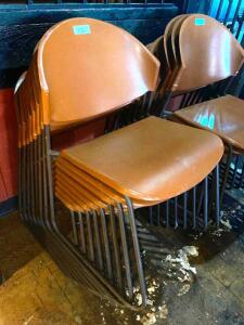 DESCRIPTION: (8) BROWN PLASTIC STACK CHAIRS. LOCATION: BAR THIS LOT IS: SOLD BY THE PIECE QTY: 8