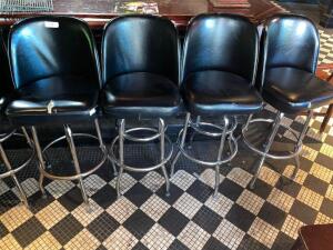 DESCRIPTION: (4) 30" BLACK BARREL BACK BAR STOOLS ADDITIONAL INFORMATION ALL HAVE SOME DAMAGE TO SEAT CUSHIONS LOCATION: BAR THIS LOT IS: SOLD BY THE