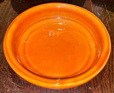 DESCRIPTION: (24) 6.5" ORANGE CERAMIC PLATES SIZE 6.5" LOCATION: BAR THIS LOT IS: SOLD BY THE PIECE QTY: 24