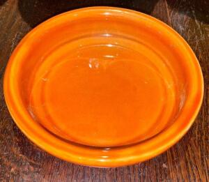 DESCRIPTION: (24) 6.5" ORANGE CERAMIC PLATES SIZE 6.5" LOCATION: BAR THIS LOT IS: SOLD BY THE PIECE QTY: 24