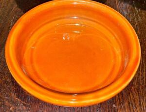 DESCRIPTION: (24) 6.5" ORANGE CERAMIC PLATES SIZE 6.5" LOCATION: BAR THIS LOT IS: SOLD BY THE PIECE QTY: 24