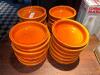 DESCRIPTION: (24) 6.5" ORANGE CERAMIC PLATES SIZE 6.5" LOCATION: BAR THIS LOT IS: SOLD BY THE PIECE QTY: 24 - 2