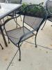 60" X 37" GLASS TOP PATIO TABLE W/ (6) WROUGHT IRON CHAIRS. - 3
