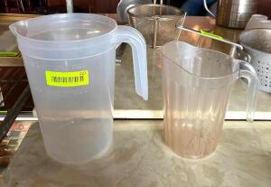 DESCRIPTION: (2) PLASTIC PITCHERS QTY: 1