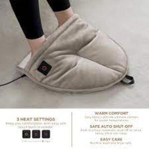 DESCRIPTION: (1) HEATED PLUSH FOOT WARMER BRAND/MODEL: BROOKSTONE INFORMATION: TAUPE RETAIL$: $30.00 EA QTY: 1