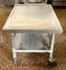 24" STAINLESS STEEL EQUIPMENT STAND ON CASTERS