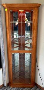 WOODEN CORNER CABINET WITH GLASS SHELVES AND LIGHT