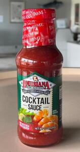 DESCRIPTION: (8) - BOTTLES OF LOUISIANA COCKTAIL SAUCE LOCATION: FRONT QTY: 8