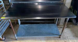 DESCRIPTION: 72" X 30" STAINLESS TABLE W/ GALV UNDER SHELF. SIZE: 72" X 30" LOCATION: WAREHOUSE QTY: 1