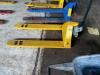 DESCRIPTION: 2 TON CAPACITY PALLET JACK INFORMATION: YELLOW. IN WORKING ORDER LOCATION: WAREHOUSE QTY: 1 - 2
