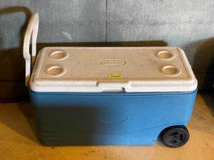 DESCRIPTION: COLEMAN ROLLING COOLER LOCATION: WAREHOUSE QTY: 1