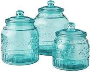 (1) SET OF GLASS CANISTERS