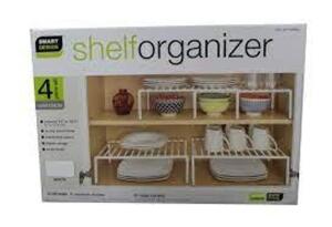 (1) 4 PIECE SET OF SHELF ORGANIZER