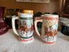 DESCRIPTION: ASSORTED STEINS AS SHOWN QTY: 1 - 2