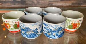 DESCRIPTION: DECORATIVE TEA CUPS AS SHOWN QTY: 1