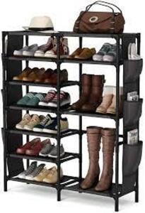 DESCRIPTION: (1) SHOE RACK BRAND/MODEL: TRIBESIGNS #L008BK INFORMATION: BLACK RETAIL$: $30.00 EA SIZE: 24-30 PAIRS OF SHOES QTY: 1