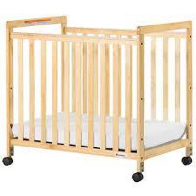 DESCRIPTION: (1) COMPACT CRIB BRAND/MODEL: FOUNDATIONS #1632040 INFORMATION: WOOD NATURAL RETAIL$: $400.00 EA SIZE: 39X26 QTY: 1