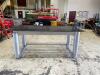 DESCRIPTION: 96" X 48" INDUSTRIAL HEAVY DUTY STEEL WORK TABLE W/ MOUNTED VISE ON CASTERS INFORMATION: 1/2" STEEL TOP LOCATION: WAREHOUSE QTY: 1 - 7