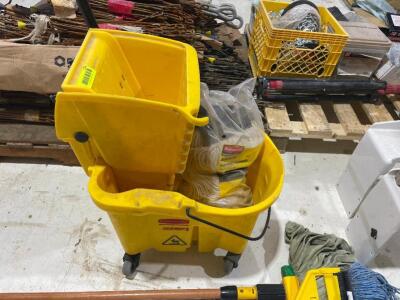 DESCRIPTION: YELLOW MOP BUCKET AND WRINGER. ADDITIONAL INFORMATION: W/ MOP LOCATION SHOP QTY: 1