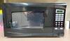 DESCRIPTION: RIVAL 0.7 CU FT 700 WATT DIGITAL MICROWAVE BRAND/MODEL: RIVAL LOCATION: UPSTAIRS OFFICE QTY: 1