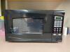 DESCRIPTION: RIVAL 0.7 CU FT 700 WATT DIGITAL MICROWAVE BRAND/MODEL: RIVAL LOCATION: UPSTAIRS OFFICE QTY: 1 - 2