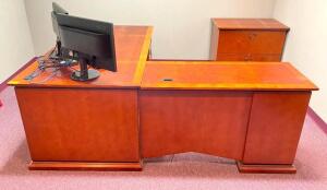 DESCRIPTION: 7' X 6' L-SHAPED WOODEN OFFICE DESK W/ 2-DRAWER FILE CABINET LOCATION: UPSTAIRS OFFICE QTY: 1