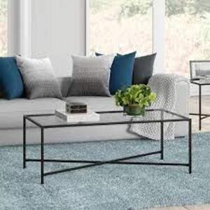 DESCRIPTION: (1) COFFEE TABLE WITH GLASS TOP BRAND/MODEL: HENLEY #CT0824 INFORMATION: BLACKENED BRONZE AND GLASS RETAIL$: $133.99 EA SIZE: 51.38"W 27.