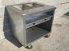 DESCRIPTION: DELFIELD TWO WELL ELECTRIC STEAM TABLE. BRAND / MODEL: DELFIELD EHE136C ADDITIONAL INFORMATION 208/230 VOLT, PHASE. ON CASTERS LOCATION: - 2