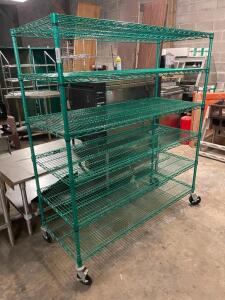 DESCRIPTION: 60" X 24" SIX TIER COATED WIRE SHELF ON CASTERS. SIZE 60" X 24" X 72" LOCATION: BAY 6 QTY: 1