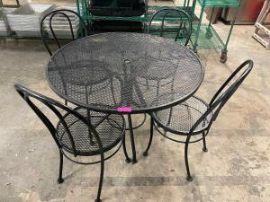 DESCRIPTION: 41" WROUGHT IRON PATIO TABLE W/ (4) CHAIRS SIZE 41" ROUND LOCATION: BAY 6 THIS LOT IS: ONE MONEY QTY: 1