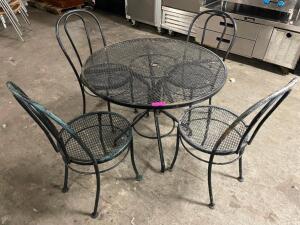 DESCRIPTION: 36" WROUGHT IRON PATIO TABLE W/ (4) CHAIRS SIZE 36" ROUND LOCATION: BAY 6 THIS LOT IS: ONE MONEY QTY: 1