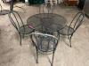 DESCRIPTION: 36" WROUGHT IRON PATIO TABLE W/ (4) CHAIRS SIZE 36" ROUND LOCATION: BAY 6 THIS LOT IS: ONE MONEY QTY: 1 - 2