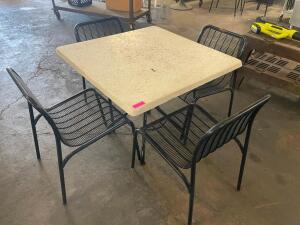 DESCRIPTION: 36" X 36" COMPOSITE PATIO TABLE W/ (4) METAL PATIO CHAIRS SIZE 36" X 36" LOCATION: BAY 6 QTY: 1