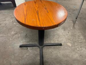 DESCRIPTION: 24" ROUND HARDWOOD TABLE W/ BASE. ADDITIONAL INFORMATION TAKEN APART SIZE 24" R LOCATION: BAY 6 QTY: 1