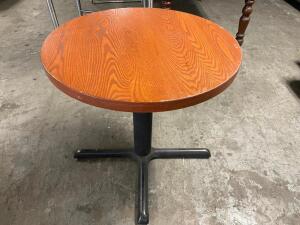 DESCRIPTION: 30" ROUND HARDWOOD TABLE W/ BASE. ADDITIONAL INFORMATION TAKEN APART SIZE 30" R LOCATION: BAY 6 QTY: 1