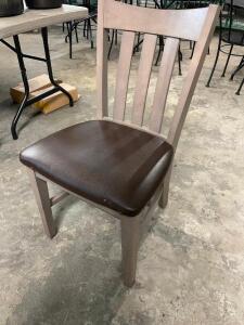 DESCRIPTION: (4) BAR BACK WOODEN CHAIRS W/ BROWN PADDED SEATS. BRAND / MODEL: AMERICAN CHAIR AND SEATING LOCATION: BAY 6 THIS LOT IS: SOLD BY THE PIEC