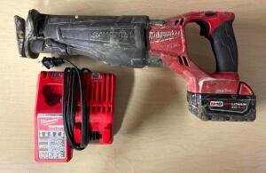 DESCRIPTION: MILWAUKEE 18V CORDLESS SAWZALL RECIPROCATING SAW BRAND/MODEL: MILWAUKEE INFORMATION: BATTERY AND CHARGER INCLUDED LOCATION: SHOWROOM 2 QT