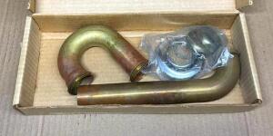 DESCRIPTION: (2) 1-1/4" BRASS P-TRAP (UNFINISHED) LOCATION: SHOWROOM #2 QTY: 2