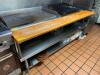 DESCRIPTION: 72" LOW BOY STAINLESS EQUIPMENT STAND W/ BUTCHER BLOCK FRONT RISER CUTTING BOARD. SIZE 72" X 30" LOCATION: KITCHEN QTY: 1