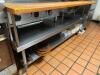 DESCRIPTION: 72" LOW BOY STAINLESS EQUIPMENT STAND W/ BUTCHER BLOCK FRONT RISER CUTTING BOARD. SIZE 72" X 30" LOCATION: KITCHEN QTY: 1 - 2