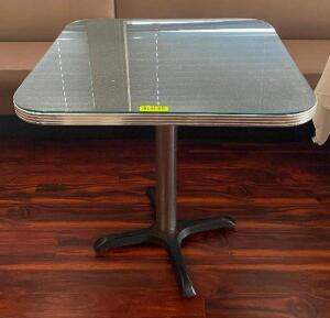 NAME: 29.5" DINING TABLE WITH GLASS PANEL TOP DESCRIPTION: 29.5" DINING TABLE WITH GLASS PANEL TOP ADDITIONAL INFORMATION: TABLE CLOTH NOT INCLUDED. C