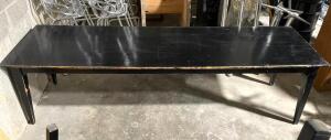 DESCRIPTION: 108" X 30" WOODEN DINING TABLE-BLACK LOCATION: AREA #6 QTY: 1