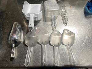 DESCRIPTION: (8) ASSORTED PLASTIC AND STAINLESS SCOOPS LOCATION: AREA #2 THIS LOT IS: ONE MONEY QTY: 1