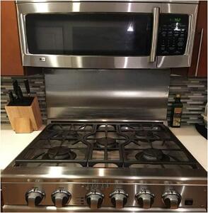 DESCRIPTION: (2) STAINLESS STEEL BACKSPLASHESINFORMATION: PEEL AWAY PVC COATING TO PROTECT AGAINST SCRATCHES DURING INSTALLATIONRETAIL$: $87.77/EASIZE: APPROX 30" X 30", 24GQTY: 2