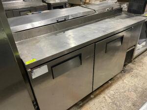 DESCRIPTION: TRUE 67" PIZZA PREP COOLER BRAND / MODEL: TRUE TPP-67 ADDITIONAL INFORMATION AN# 1-2867992, 115 VOLT, 1 PHASE. MISSING COMPRESSOR COVER.